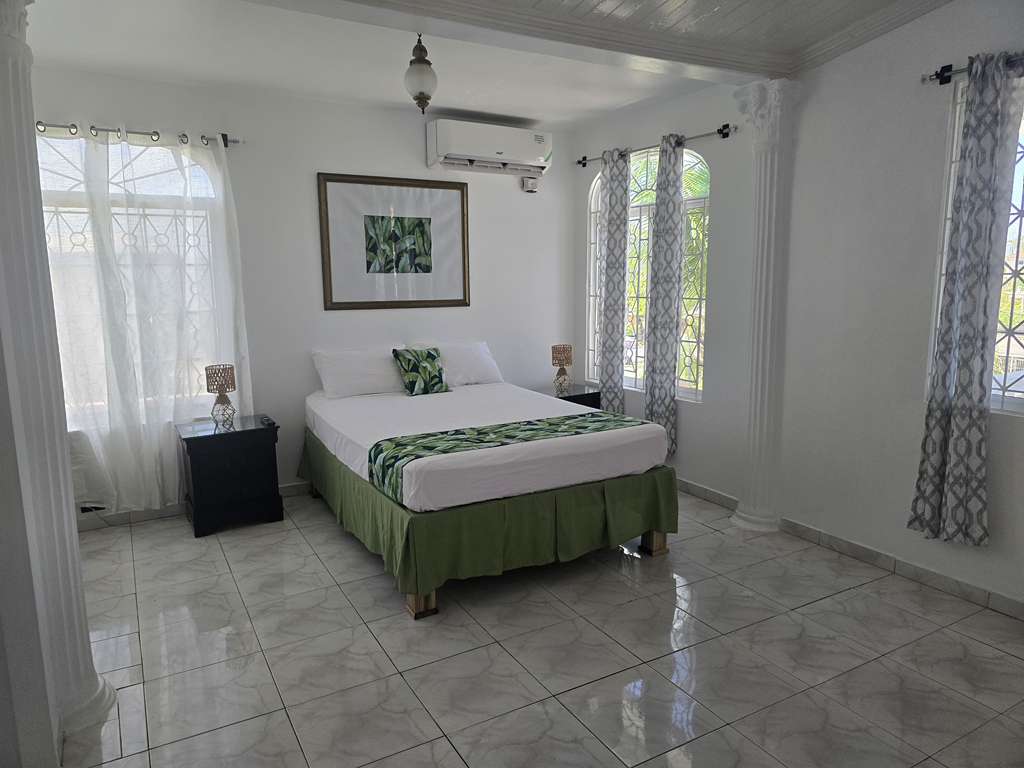 Bright and airy guest bedroom designed for comfort