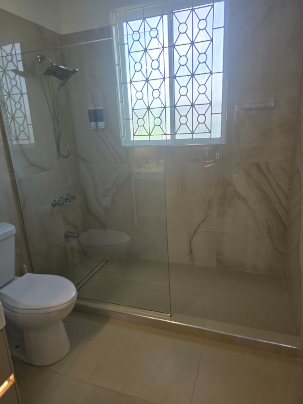 Exquisite tile work in the master bathroom