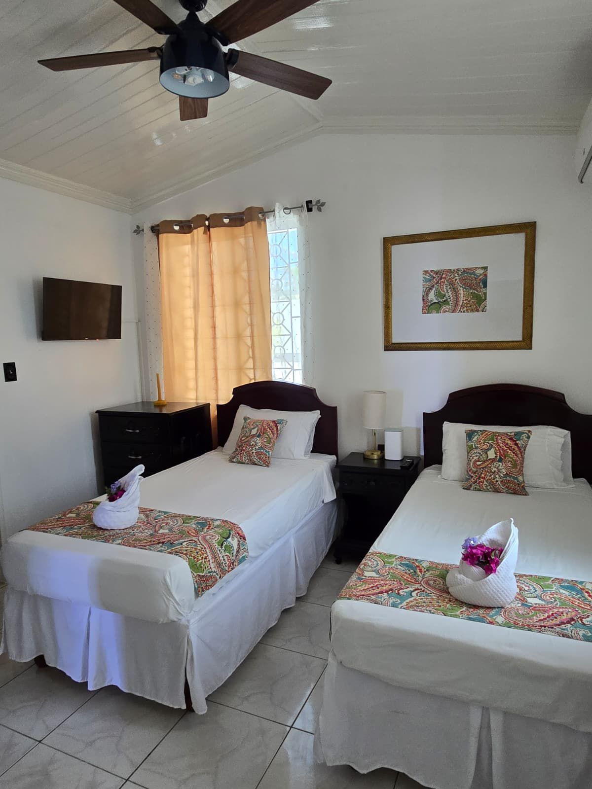 Guest room configured with two comfortable twin beds