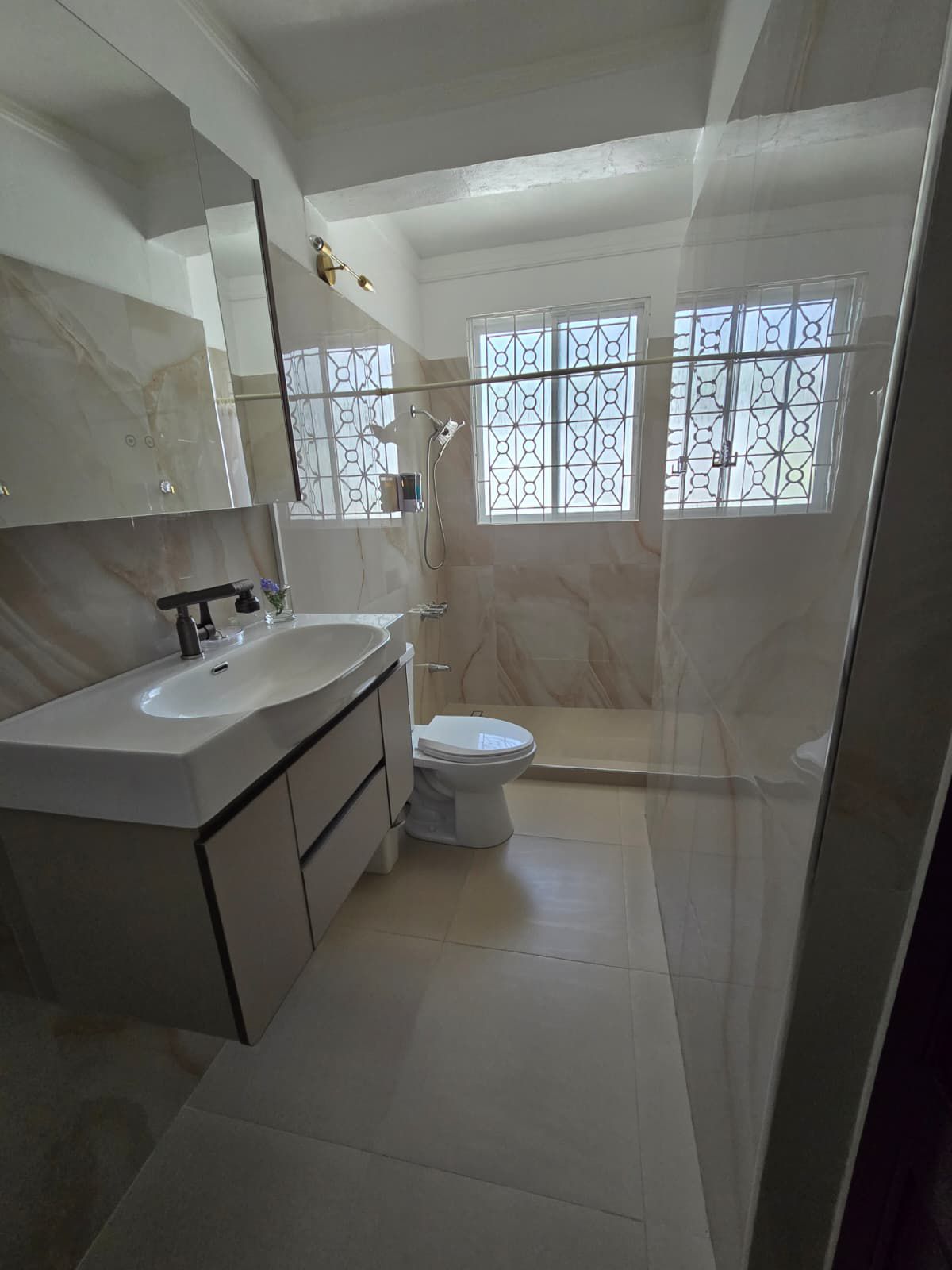 Heated towel rack with plush white towels