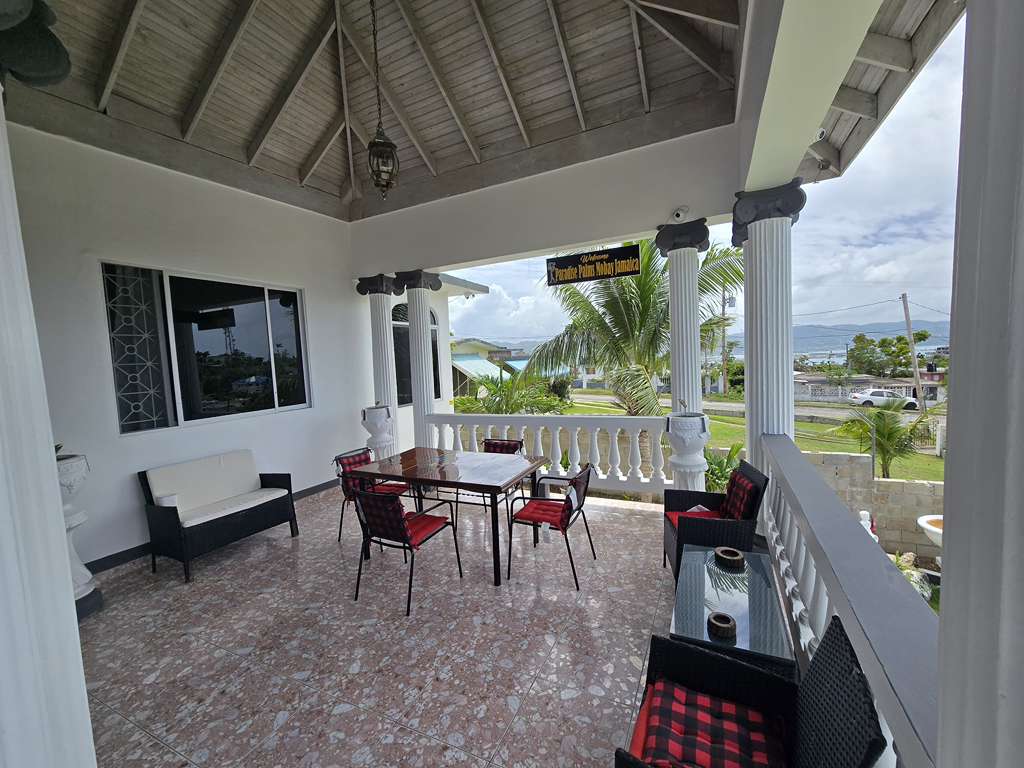 Lush tropical plants surrounding the property