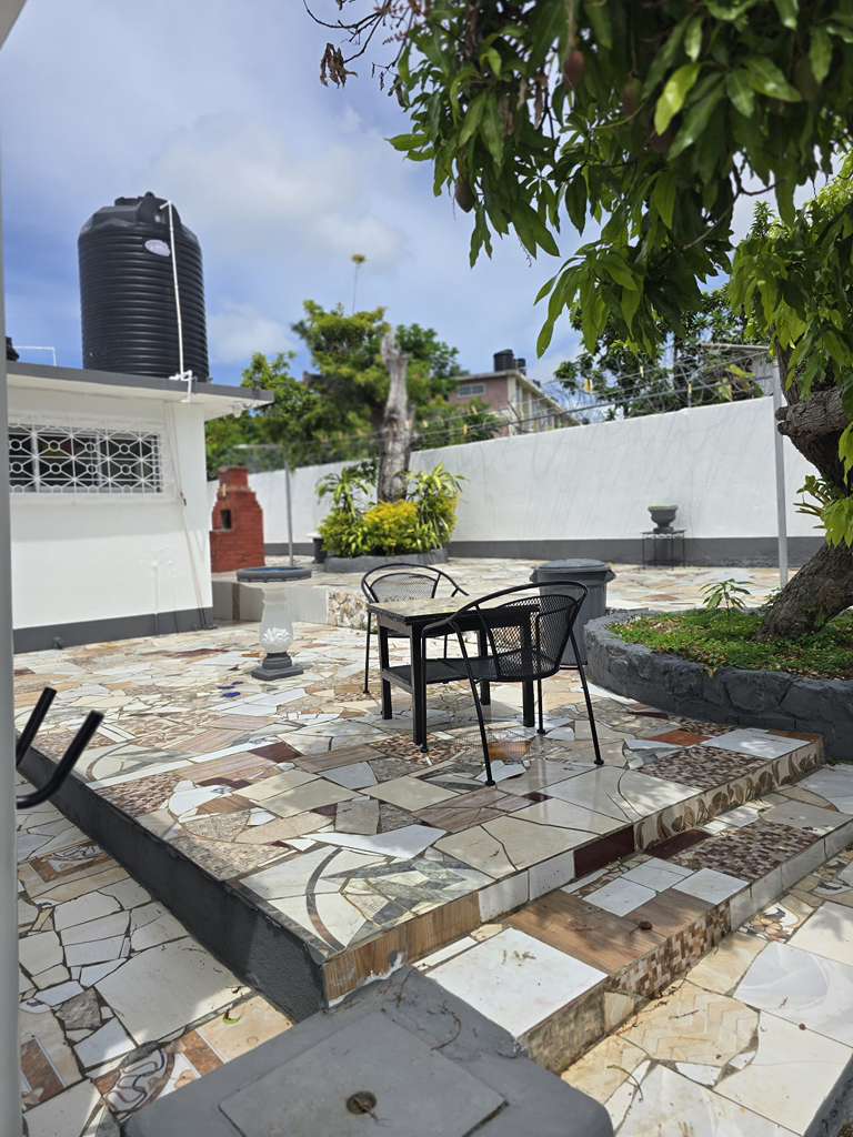 Al fresco dining setup on the main patio