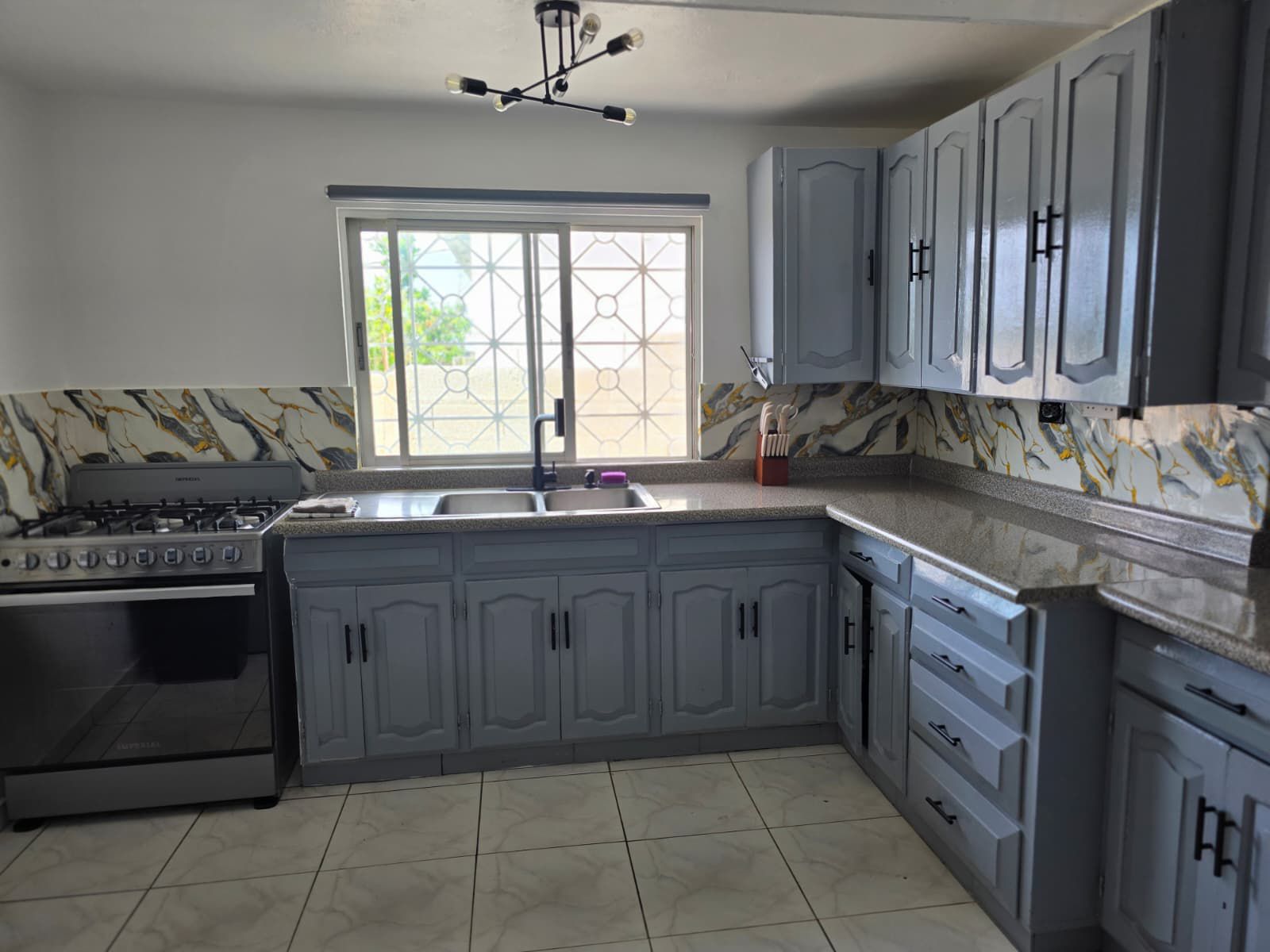 Large stainless steel refrigerator for guest use